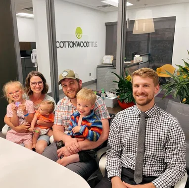 Jason with a client family at closing