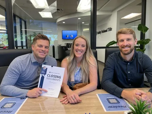 Jason with clients at closing