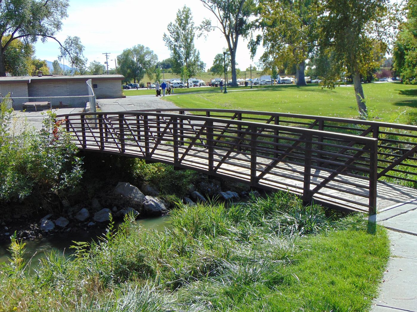 A footbridge over Little Cottonwood Creek in Murray City Park, Murray, Utah